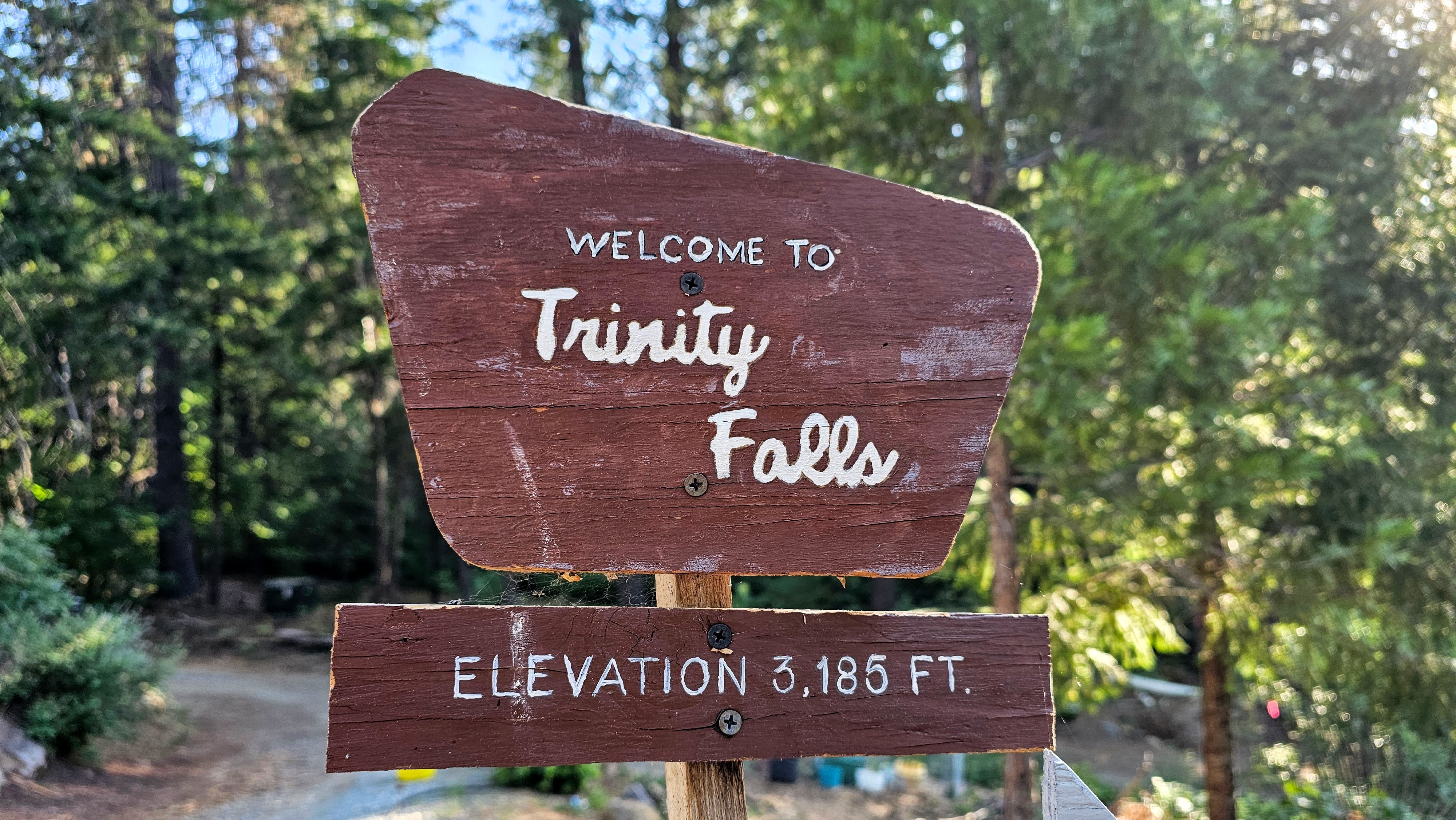 The front gate or sign for Trinity Falls Farm.